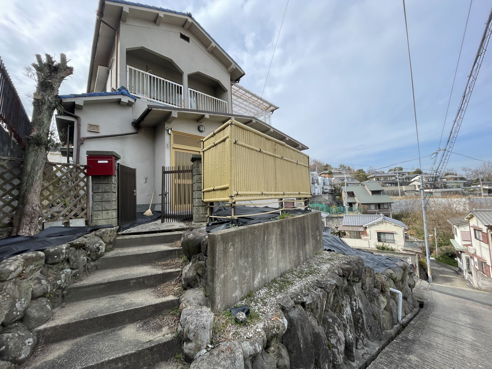 Outside of Ikoma Sharehouse on a hillside street